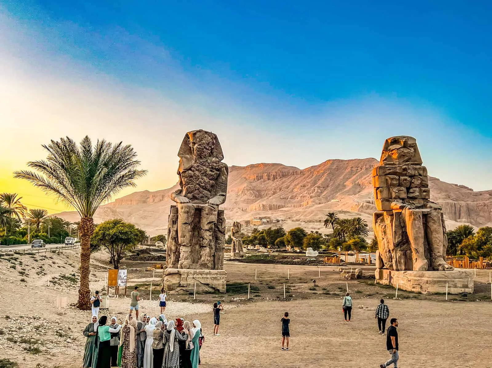 3. In the desert, ancient Egyptian statues endure, symbolizing the timeless artistry and history of ancient civilization while our Egypt itinerary 9 days