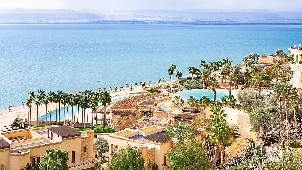 A serene view of the Dead Sea resort in Israel, showcasing its unique landscape and tranquil waters while our Jordan itineraryb 8 days