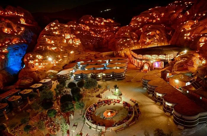 A serene night view of a resort illuminated by soft lights, creating a tranquil and inviting atmosphere in Jordan itinerary 5 days