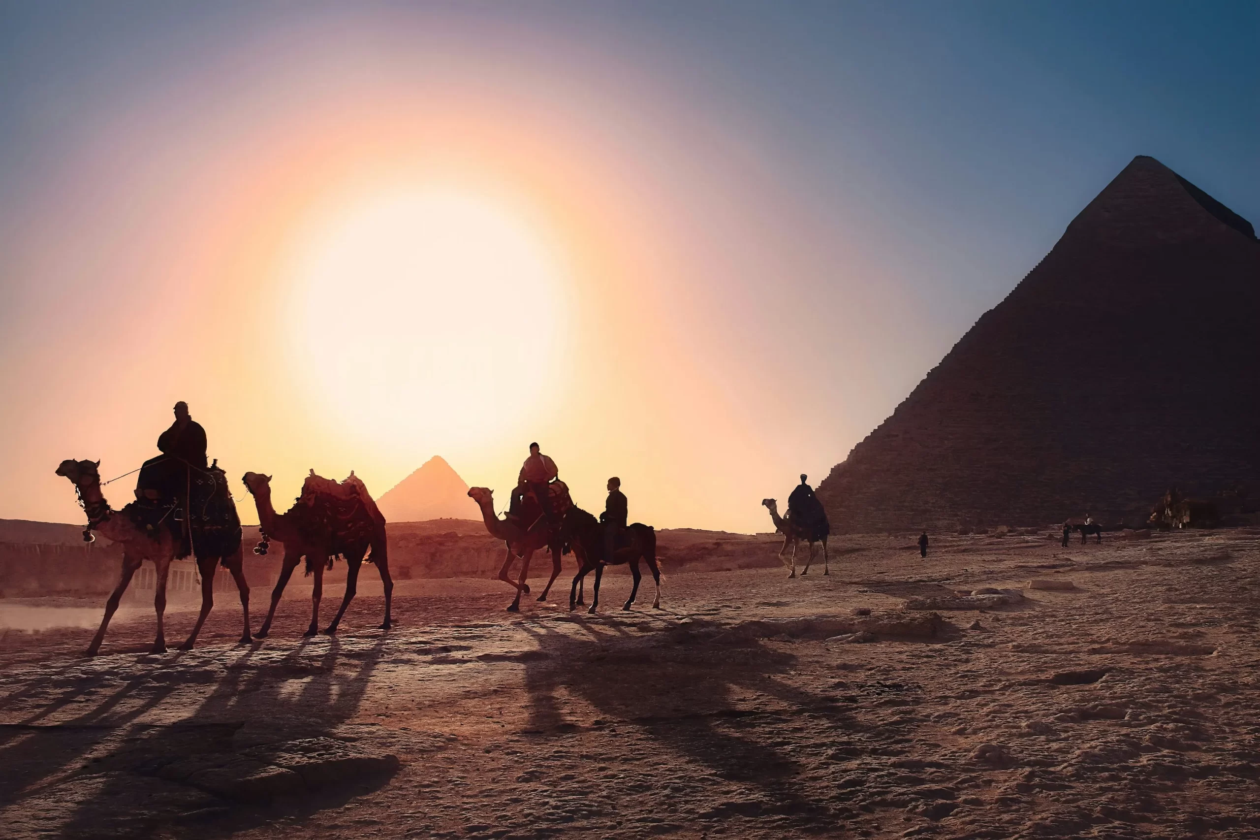 The Great Pyramid of Giza stands majestically against the Egyptian landscape, showcasing ancient architectural brilliance.