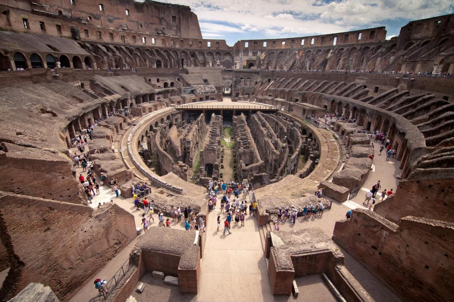 The Colosseum in Rome, Italy, showcasing its ancient architecture and grandeur against a clear blue sky in our Italy itinerary days